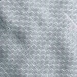 UV and agro chemical protected apron skirting laminated fabric in white and transparent colors, used for greenhouse base covering and structure protection.