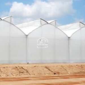 A modern butterfly vent naturally ventilated polyhouse installed by JH Agriinfra in India, promoting sustainable and climate-resilient agriculture.