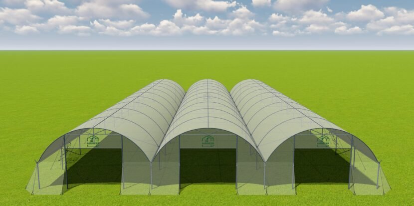 Multi span polytunnel plastic film greenhouse structure by JH Agriinfra in agricultural field